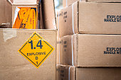 Explosive triangle placard sign on the carton box.