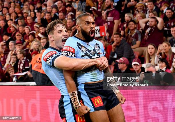 Josh Addo-Carr of the Blues celebrates with team mate Cameron Murray after scoring a try during game two of the 2021 State of Origin series between...