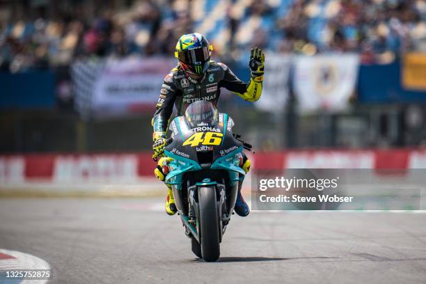 Valentino Rossi of Italy and Petronas Yamaha SRT rolls into starting grid and gestures during the Motul TT Assen race at TT Circuit Assen on June 27,...