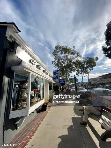 balboa island downtown with shops, locals and tourists, usa - newport beach california stock pictures, royalty-free photos & images