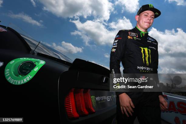 Riley Herbst, driver of the Monster Energy Ford, poses for photos on the grid prior to the NASCAR Xfinity Series Pocono Green 225 Recycled by J.P....