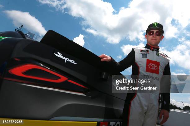 Ty Gibbs, driver of the Joe Gibbs Racing Toyota, poses for photos on the grid prior to the NASCAR Xfinity Series Pocono Green 225 Recycled by J.P....