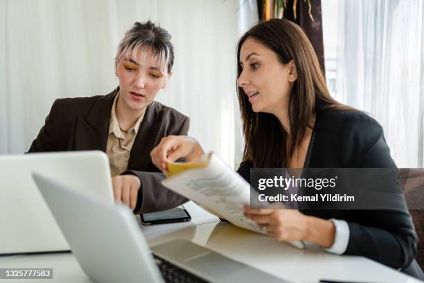 business coworkers working together at office - managing director stock pictures, royalty-free photos & images