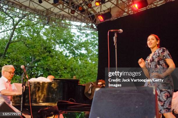 American musicians Thomas Lauderdale on piano and singer China Forbes perform with the Portland, Oregon-based pop/rock band Pink Martini at a benefit...