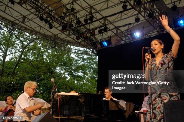 American musicians Thomas Lauderdale on piano and singer China Forbes perform with the Portland, Oregon-based pop/rock band Pink Martini at a benefit...