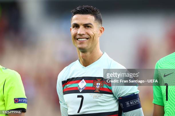 Cristiano Ronaldo of Portugal reacts as he stands for the national anthem prior to the UEFA Euro 2020 Championship Round of 16 match between Belgium...