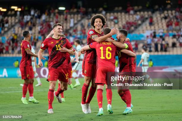 Thorgan Hazard of Belgium celebrates Thomas Meunier, Axel Witsel and Eden Hazard after scoring their side's first goal during the UEFA Euro 2020...