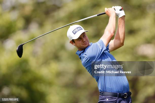 Harris English of the United States plays his shot from the sixth tee during the final round of the Travelers Championship at TPC River Highlands on...