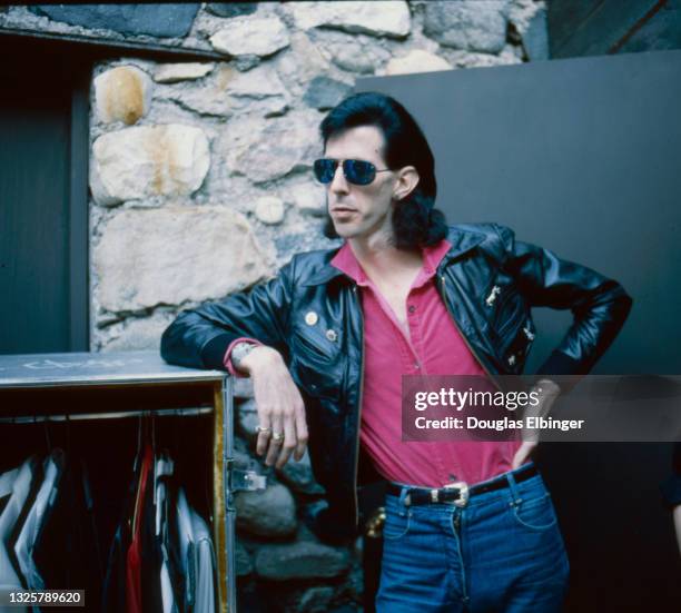 Portrait of American Rock and New Wave musician Ric Ocasek backstage at the Castle Farms music venue, Charlevoix, Michigan, September 30, 1985.