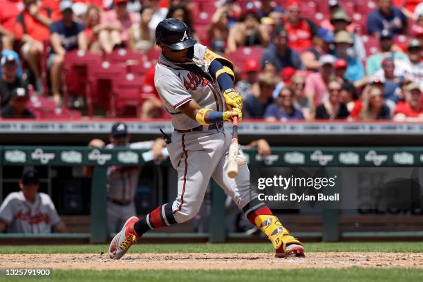 Ronald Acuna Jr. #13 of the Atlanta Braves hits a home run in the fifth inning against the Cincinnati Reds at Great American Ball Park on June 27,...