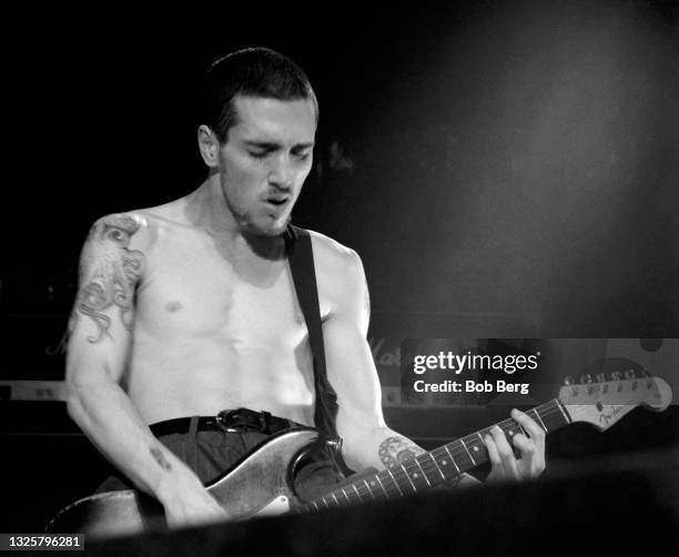 American musician John Frusciante, of the American rock band Red Hot Chili Peppers, performs on stage during the Blood Sugar Sex Magik Tour on...