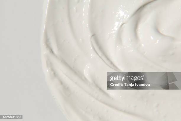 white cosmetic cream texture. lotion, moisturizer, skin care background - face cream stock pictures, royalty-free photos & images