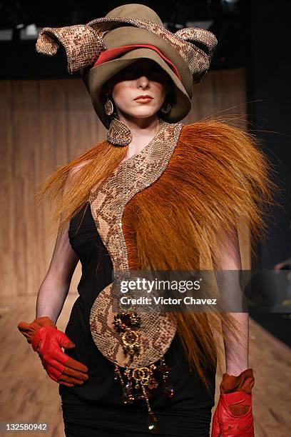 Model walks the runway wearing Gustavo Helguera jewelry and accessories Autumn/Winter 2009 during Mercedes-Benz Fashion Mexico 2009 at Antara Polanco...