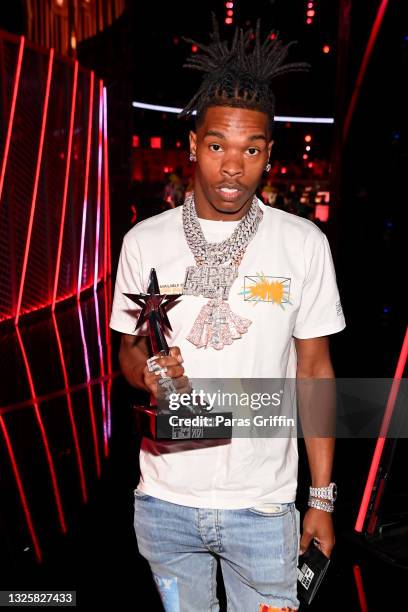 Best Male Hip Hop Artist award winner Lil Baby poses at the BET Awards 2021 at Microsoft Theater on June 27, 2021 in Los Angeles, California.