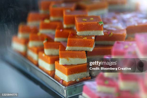 indian sweet - mumbai market stock pictures, royalty-free photos & images