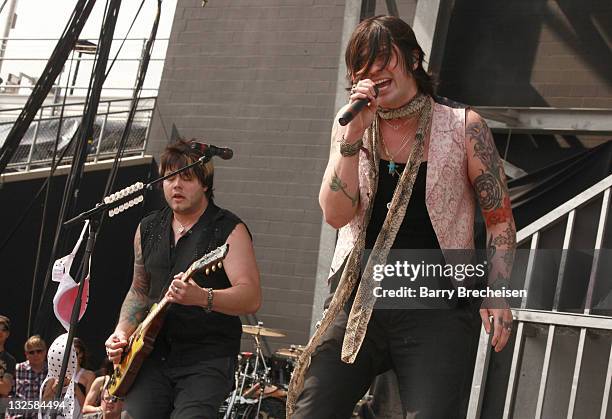 Musicians Joe Garvey and Austin Winkler of Hinder perform during the 2011 Rock On The Range festival at Crew Stadium on May 21, 2011 in Columbus,...