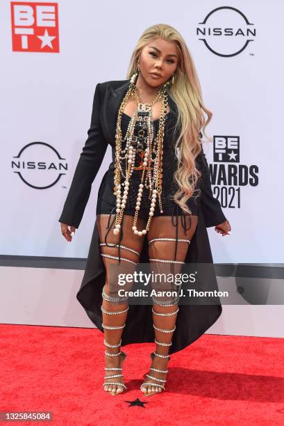 Rapper Lil' Kim attends the 2021 BET Awards at the Microsoft Theater on June 27, 2021 in Los Angeles, California.