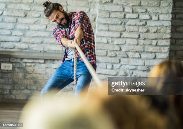 Pulling Against Rope Pulling Rope Office Photos and Premium High Res Pictures - Getty Images