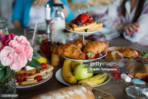 delicious looking sweet food served on a dining table for afternoon tea - the brunch stock pictures, royalty-free photos & images