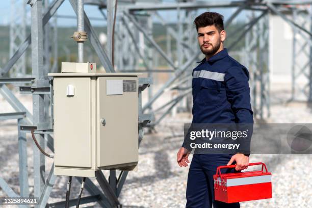 young technician working without wearing protective equipment - clumsy walker stock pictures, royalty-free photos & images