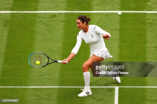 Monica Niculescu of Romania plays a forehand in her Ladies' Singles First Round match against Aryna Sabalenka of Belarus during Day One of The...