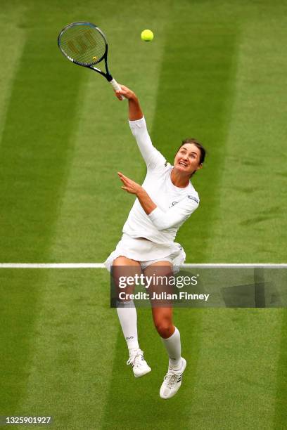 Monica Niculescu of Romania plays a forehand volley in her Ladies' Singles First Round match against Aryna Sabalenka of Belarus during Day One of The...