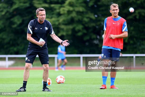 Frank Heinemann, assistant coach and Robert Tesche attend the start of VfL Bochum training at training ground on June 28, 2021 in Bochum, Germany.