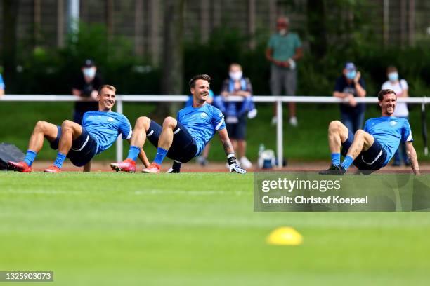 Robert Tesche, Manuel Riemann and Simon Zoller attend the start of VfL Bochum training at training ground on June 28, 2021 in Bochum, Germany.