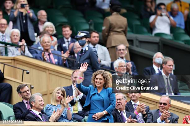 Hannah Ingram-Moore, daughter of the late Captain Sir Tom Moore acknowledges the crowd as she is introduced to the crowd on centre court ahead of the...