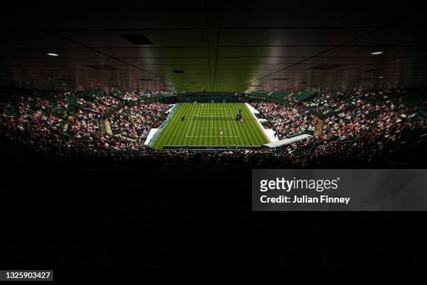 General view inside court one as Aryna Sabalenka of Belarus serves in her Ladies' Singles First Round match against Monica Niculescu of Romania...