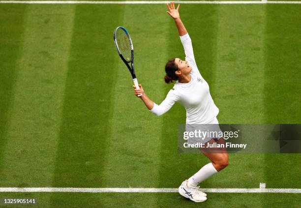 Monica Niculescu of Romania serves in her Ladies' Singles First Round match against Aryna Sabalenka of Belarus during Day One of The Championships -...