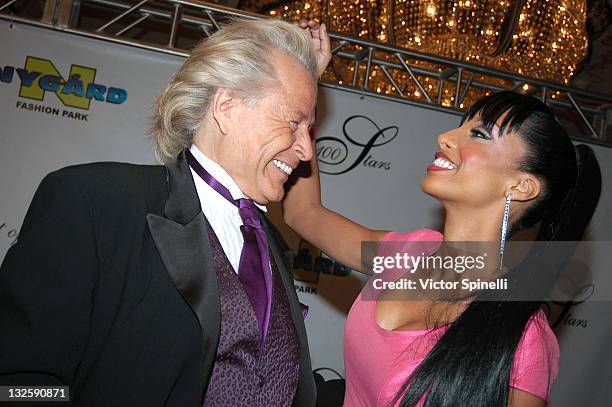 Peter Nygard and Eve during 17th Annual Night of 100 Stars Gala- Arrivals at Beverly Hills Hotel in Beverly Hills, California, United States.