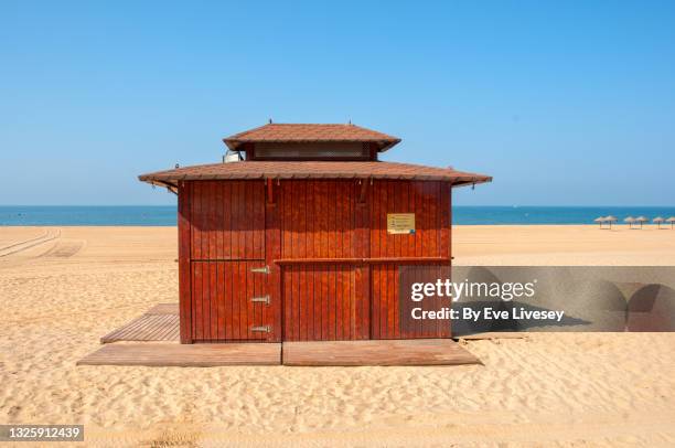 lifeguard hut on mazagon beach - wood shed stock pictures, royalty-free photos & images