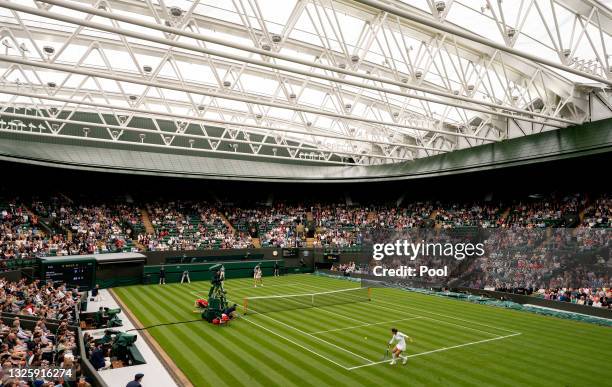 General view inside court one as Monica Niculescu of Romania plays a backhand in her Ladies' Singles First Round match against Aryna Sabalenka of...