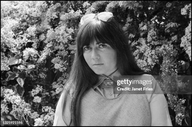 Portrait of American author Anne Rice as she poses in her garden, Berkeley, California, May 1976.