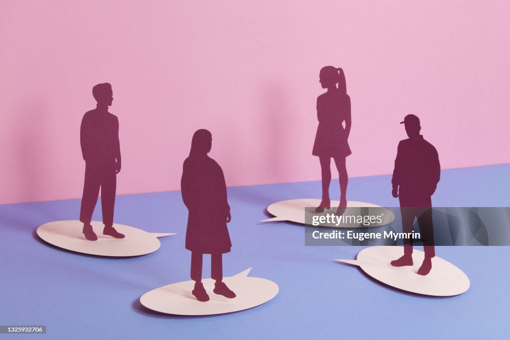 Group of people standing on speech bubbles