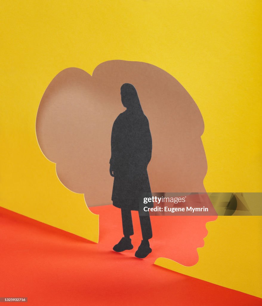 Paper craft illustration of female silhouette