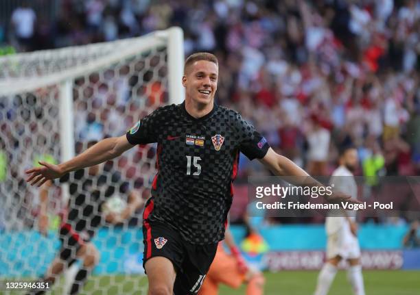 Mario Pasalic of Croatia celebrates after scoring their side's third goal during the UEFA Euro 2020 Championship Round of 16 match between Croatia...