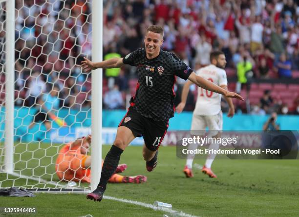 Mario Pasalic of Croatia celebrates after scoring their side's third goal during the UEFA Euro 2020 Championship Round of 16 match between Croatia...