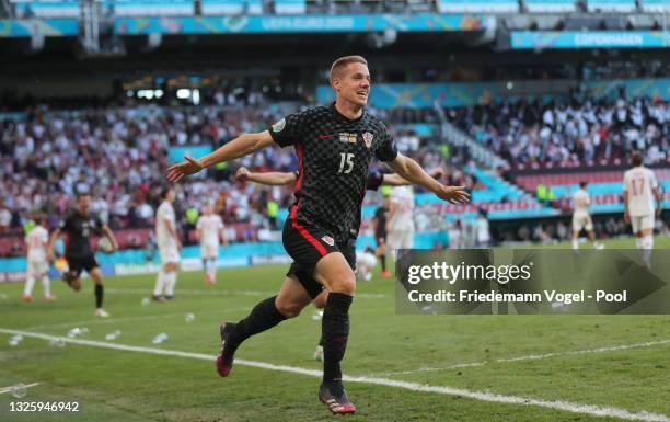 Mario Pasalic of Croatia celebrates after scoring their side's third goal during the UEFA Euro 2020 Championship Round of 16 match between Croatia...