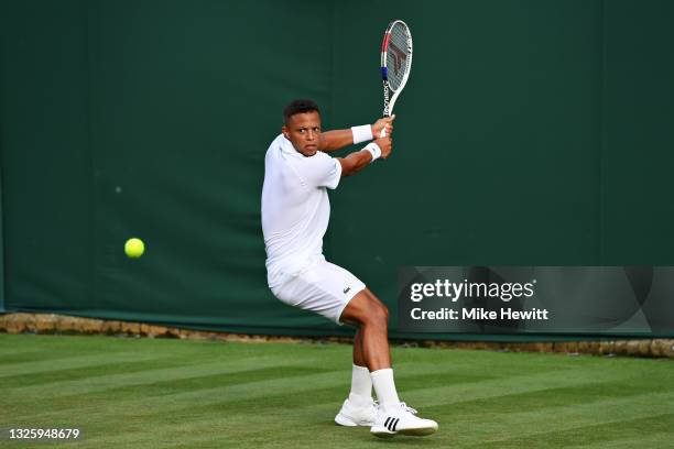 Jay Clarke of Great Britain plays a backhand in his Men's Singles First Round match against Egor Gerasimov of Belarus during Day One of The...