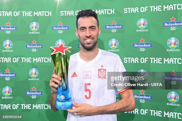 Sergio Busquets of Spain poses for a photograph with the Heineken "Star of the Match" award after the UEFA Euro 2020 Championship Round of 16 match...