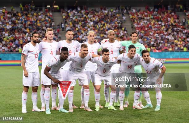 Players of Switzerland pose for a team photograph prior to the UEFA Euro 2020 Championship Round of 16 match between France and Switzerland at...