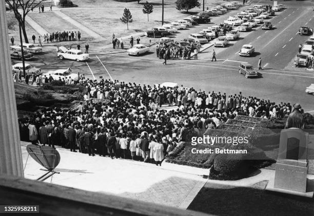 Black students from Alabama State College stage a mass rally on the steps of the Alabama State Capitol. The 1,000 students sang the Lord's Prayer and...