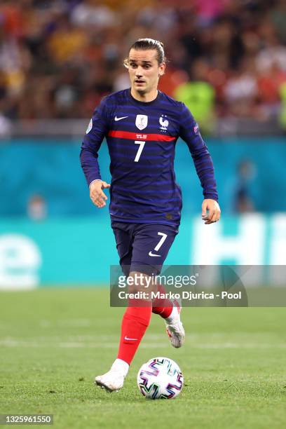Antoine Griezmann of France runs with the ball during the UEFA Euro 2020 Championship Round of 16 match between France and Switzerland at National...