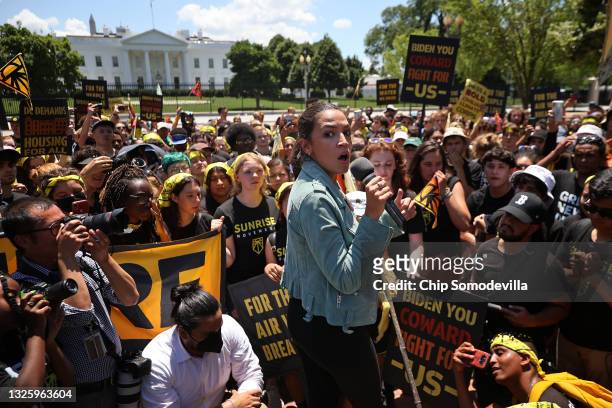 Rep. Alexandria Ocasio-Cortez rallies hundreds of young climate activists in Lafayette Square on the north side of the White House to demand that...