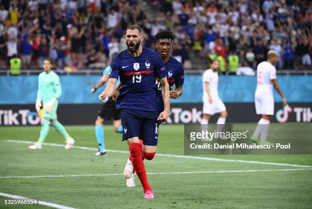 Karim Benzema of France celebrates after scoring their side's first goal during the UEFA Euro 2020 Championship Round of 16 match between France and...