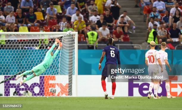 Paul Pogba of France scores their side's third goal past Yann Sommer of Switzerland during the UEFA Euro 2020 Championship Round of 16 match between...