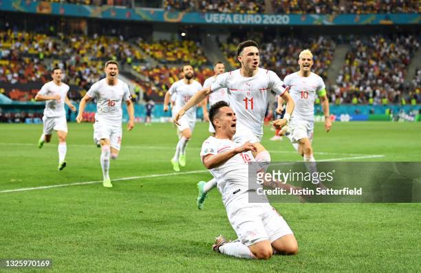 Mario Gavranovic of Switzerland celebrates after scoring their side's third goal during the UEFA Euro 2020 Championship Round of 16 match between...