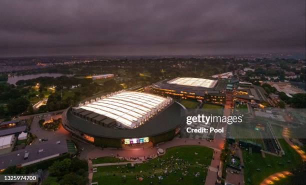 An aerial view over the grounds as closed roofs are seen on court one and centre court during Day One of The Championships - Wimbledon 2021 at All...